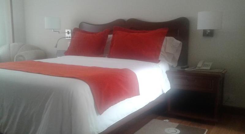 Hotel Santa Lucia Boutique Spa Bogota Exterior photo A bed with a duvet cover